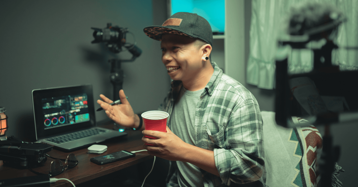 male happy holding a cup of coffee