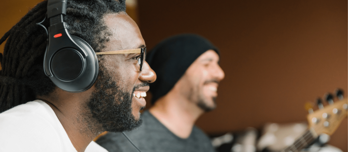 two musicians in the sound studio creating music